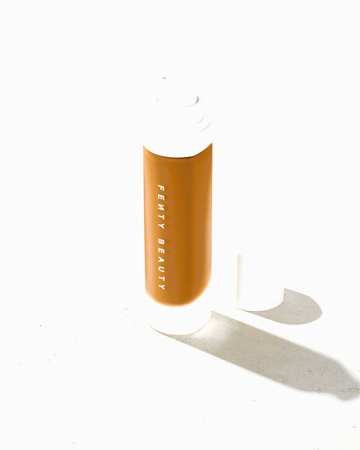 Fenty Beauty Pro Filt’r Soft Matte Longwear Foundation—highly pigmented, shine-free, buildable coverage foundation in a diverse range of shades, designed for all skin tones.